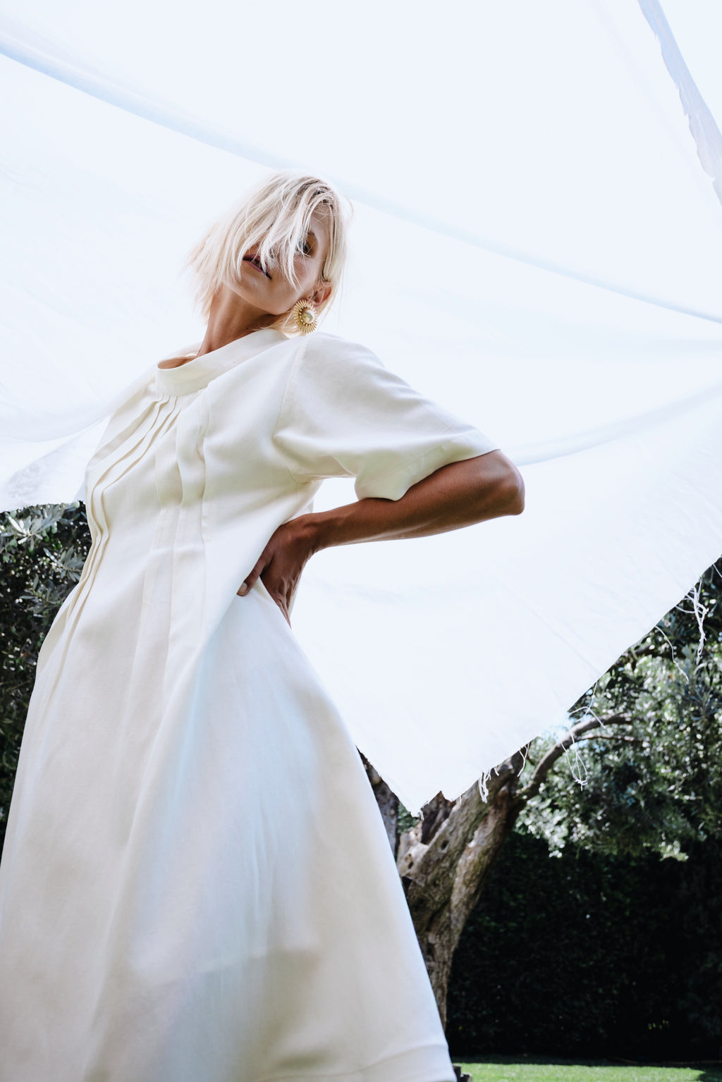 Cream linen-cotton dress with soft silhouette and natural movement