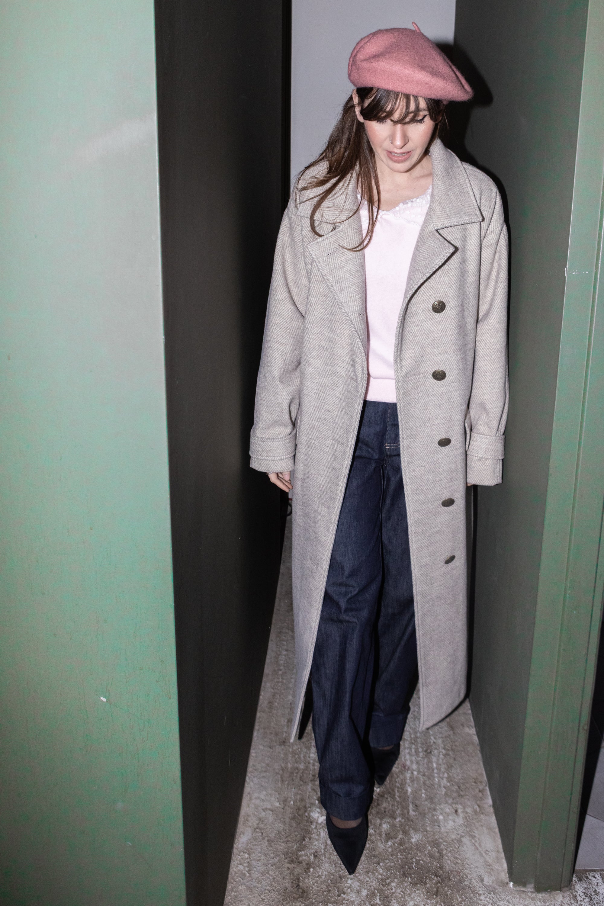 Convertible Collar Coat – full body front view, wool herringbone coat worn open with buttons, styled with beret, FW25-26 Julia Valas