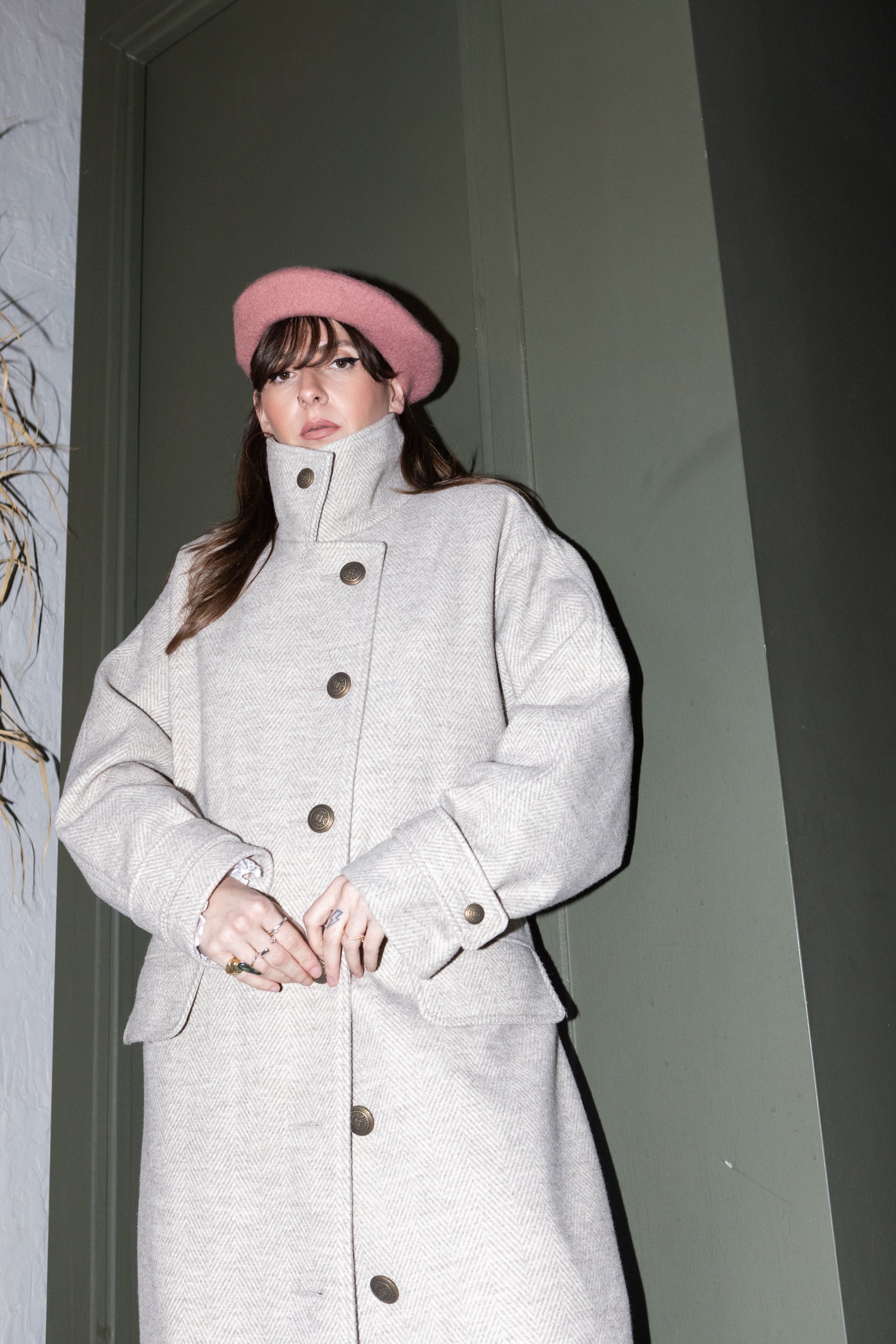 Convertible Collar Coat – high-neck closure styling, wool herringbone coat, front view with buttons, FW25-26 Julia Valas