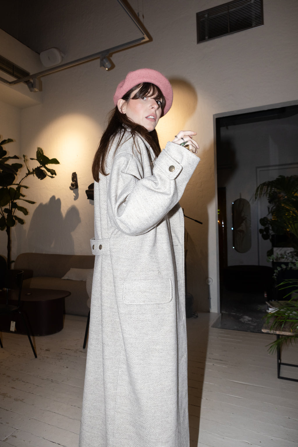 Convertible Collar Coat – oversized wool herringbone coat, side profile view, belted waist detail, pink beret styling, FW25-26 Julia Valas