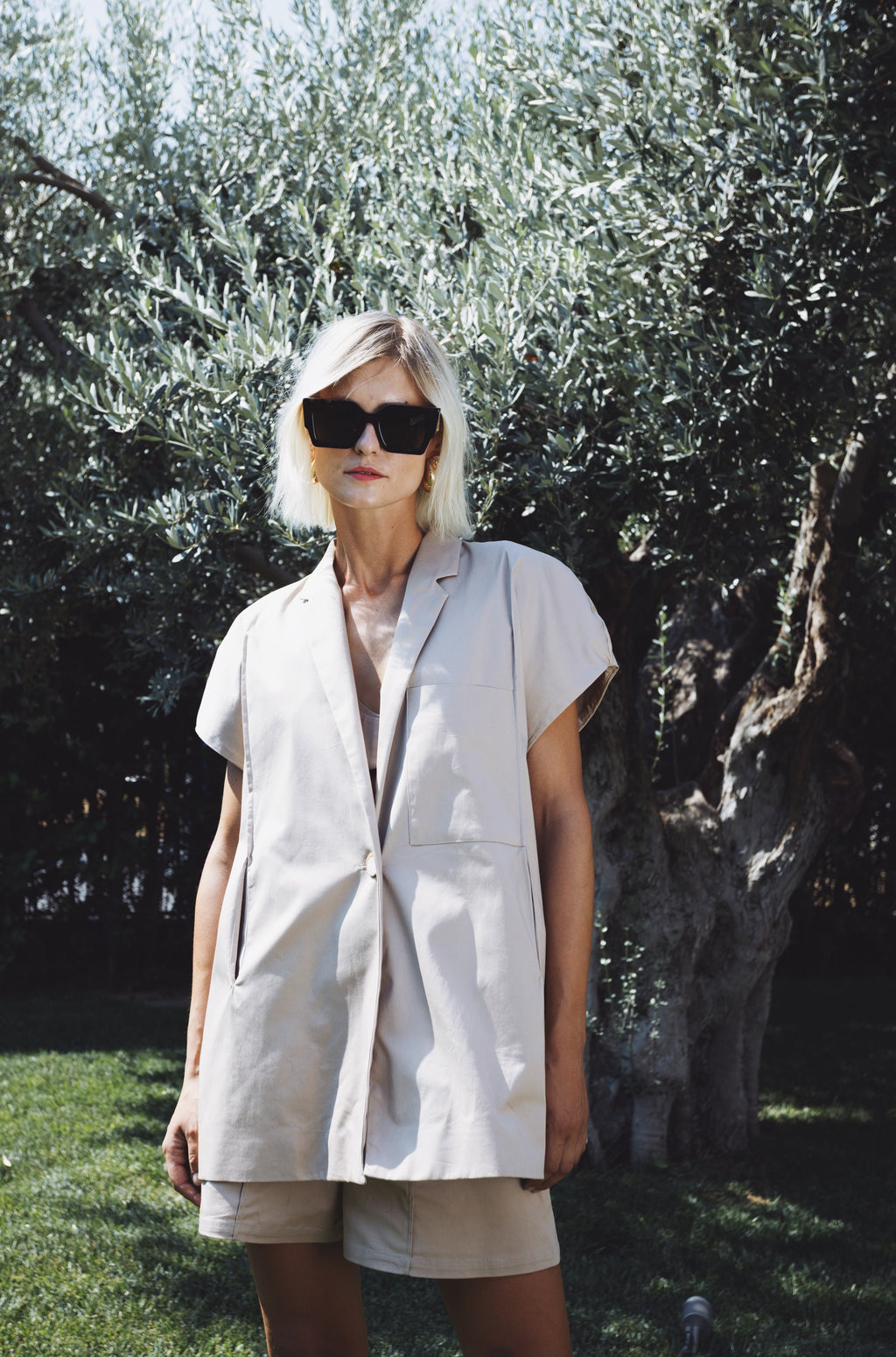 Oversized cotton Halo blazer with short voluminous sleeves, front styling view outdoors