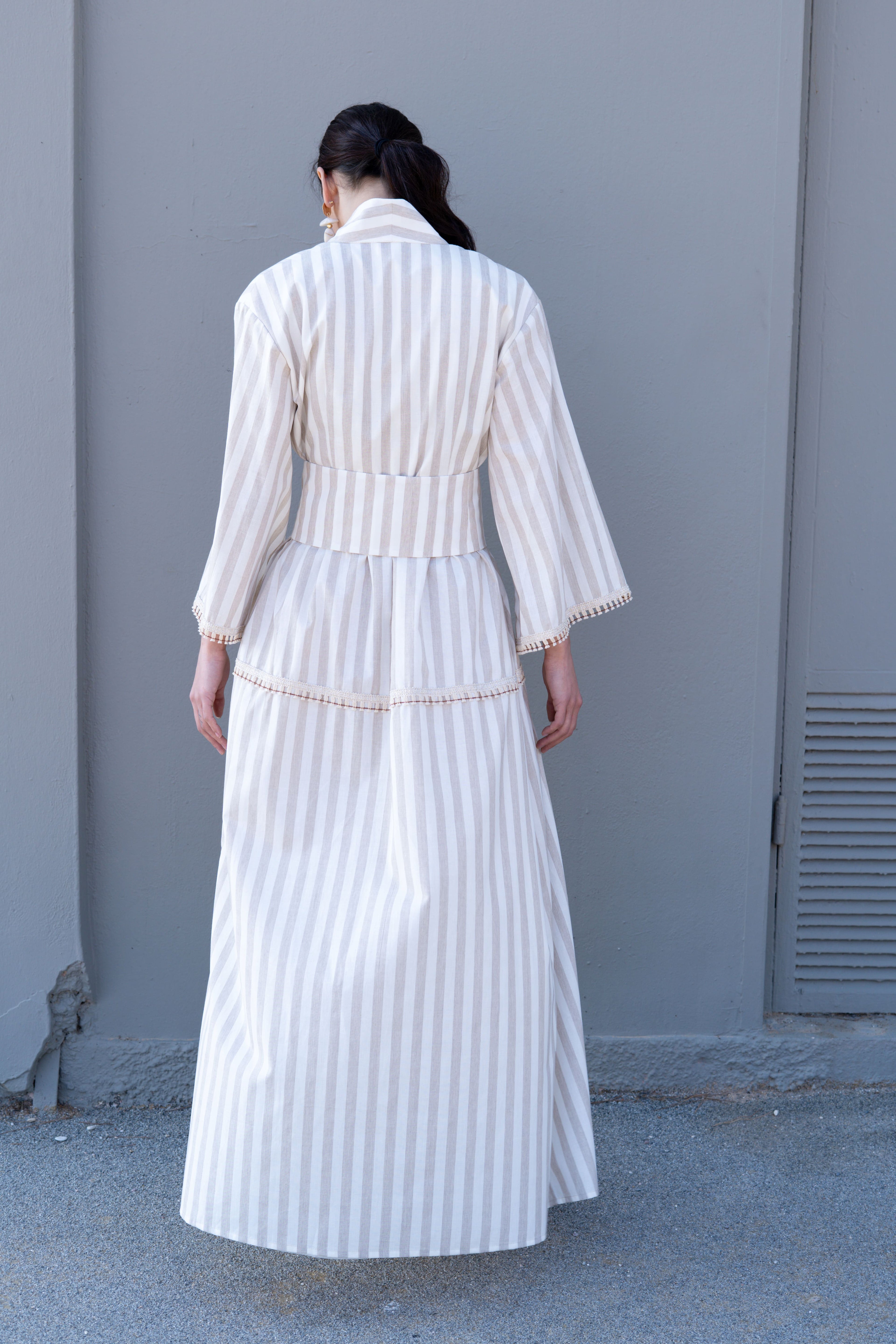 Striped cotton kimono dress back view with wide belt, layered skirt and relaxed sleeves, full length silhouette