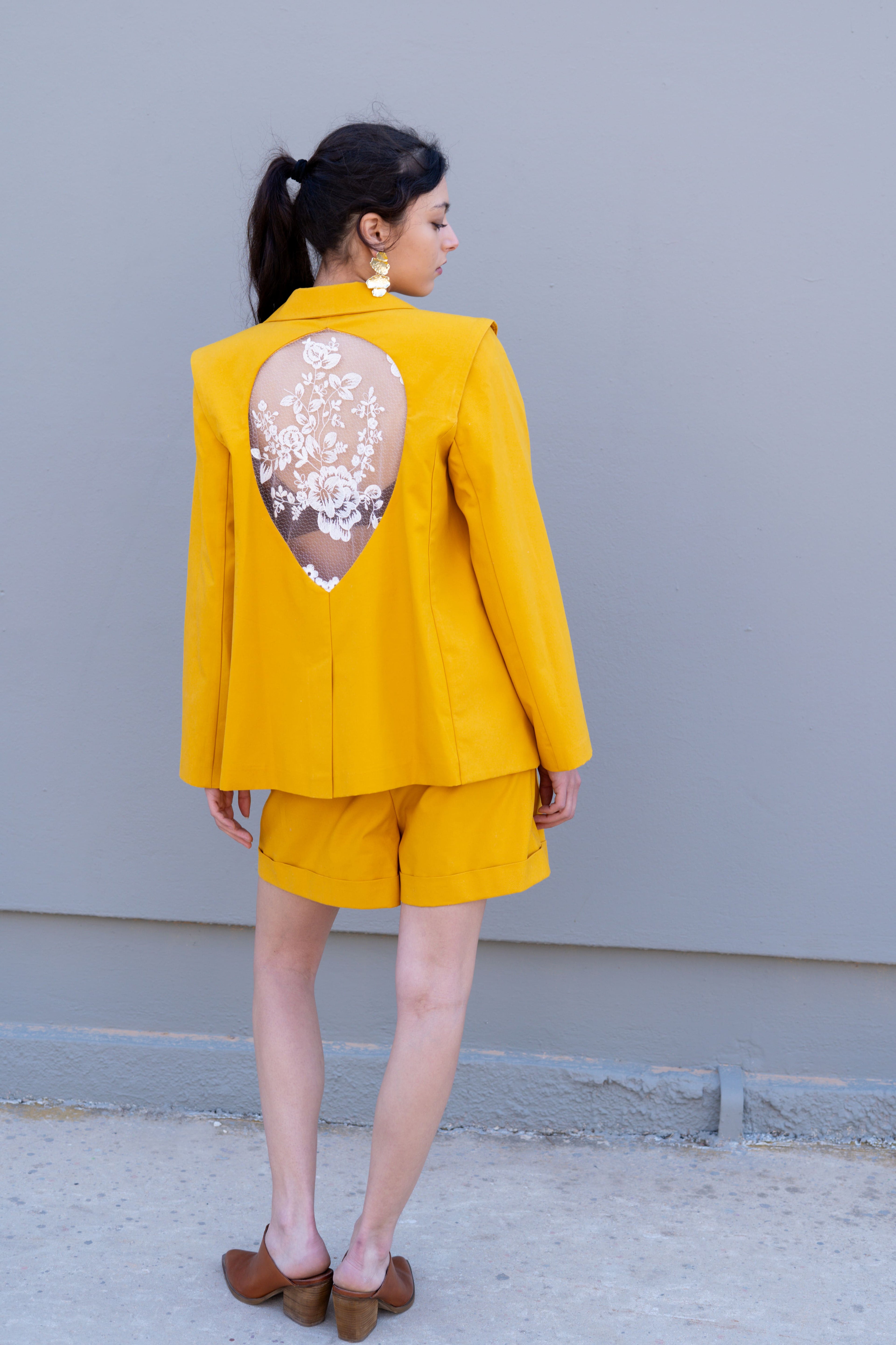 canary yellow tailored blazer set with open back teardrop cutout embroidered floral lace detail and matching bermuda shorts