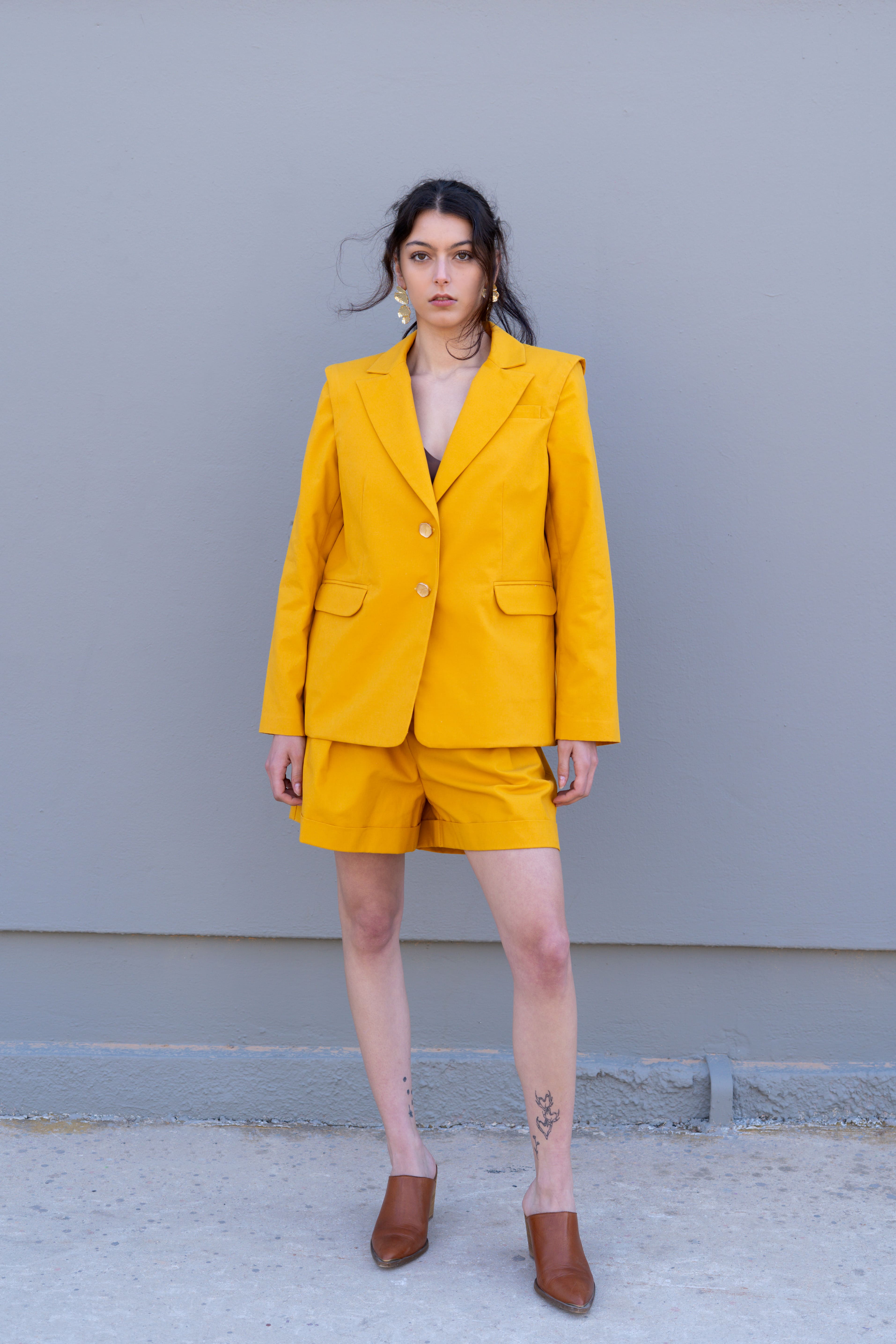 canary yellow tailored blazer with structured shoulders front view with matching bermuda shorts
