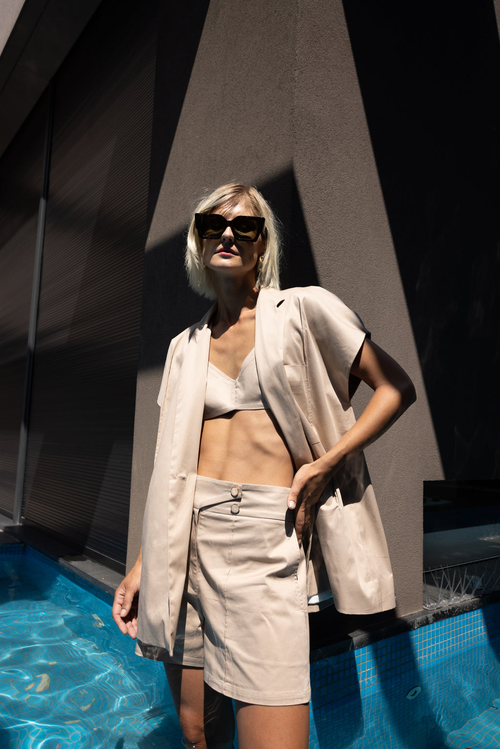 Beige tailored bermuda with matching blazer and bralette set – full look outfit by Julia Valas