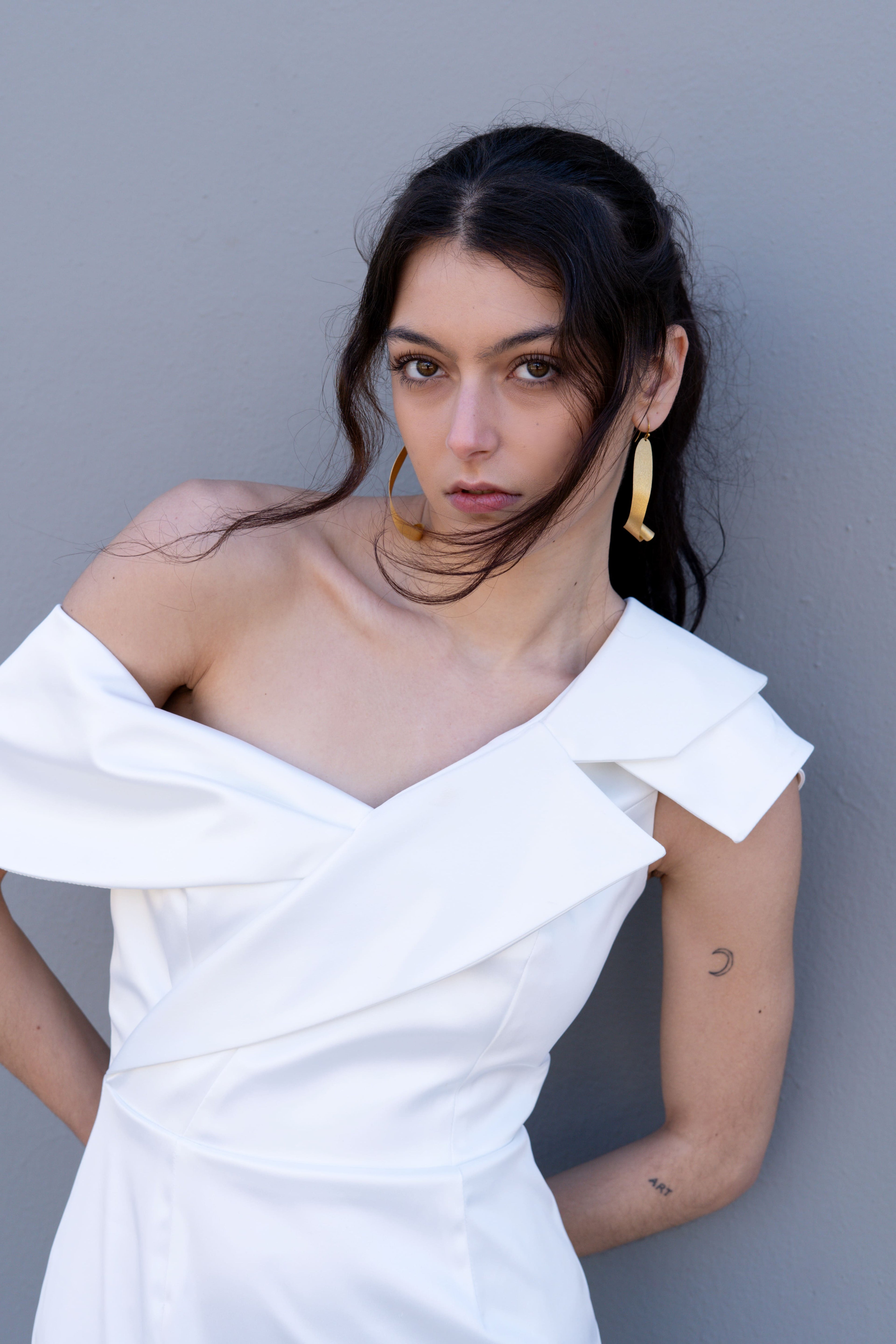modern off-shoulder bridal dress with deconstructed lapel neckline and mermaid silhouette