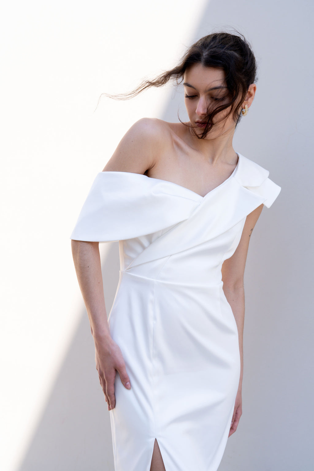one-shoulder bridal gown with deconstructed lapel neckline and front slit elegant fit