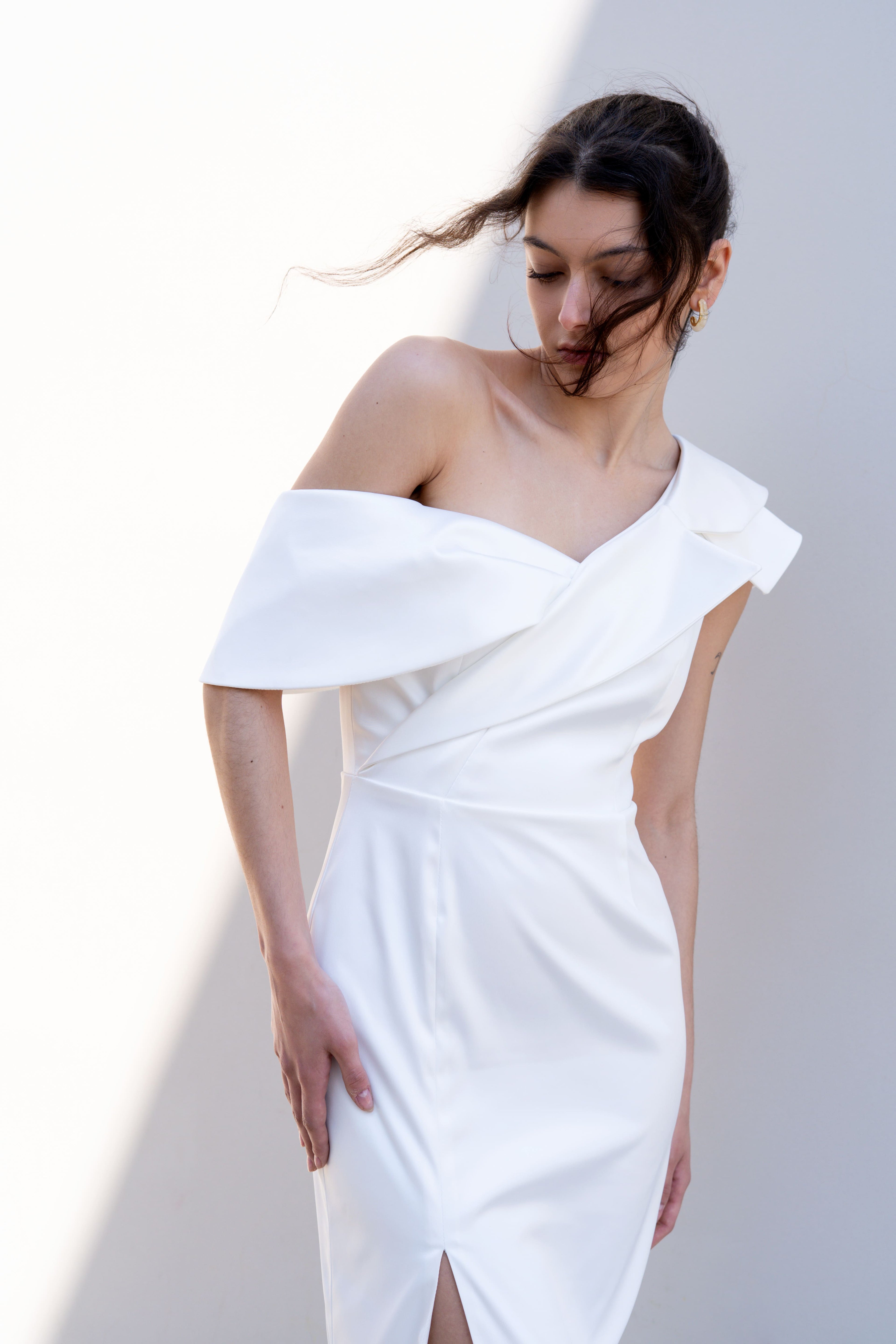 one-shoulder bridal gown with deconstructed lapel neckline and front slit elegant fit