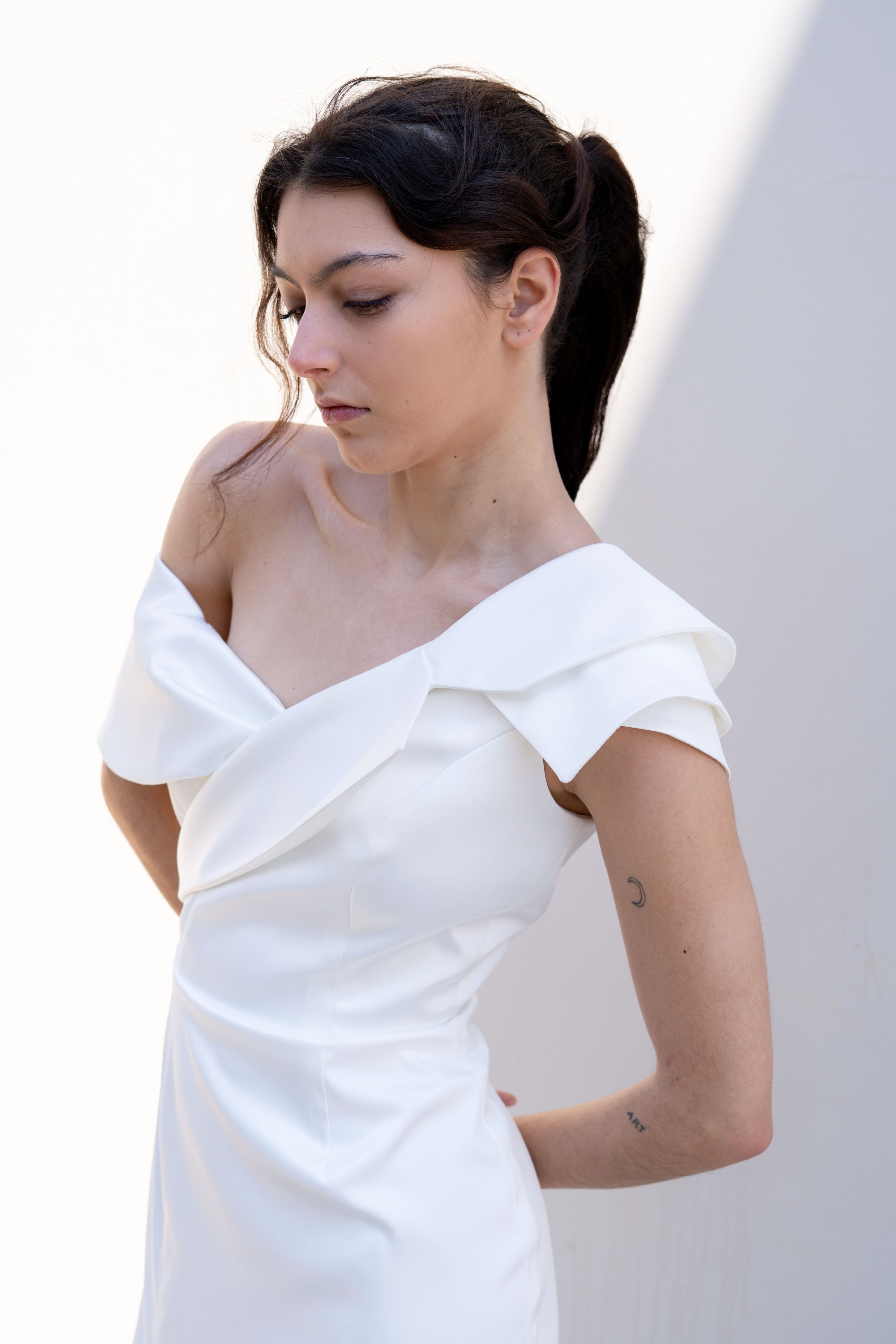 one-shoulder bridal gown with deconstructed lapel neckline elegant silhouette