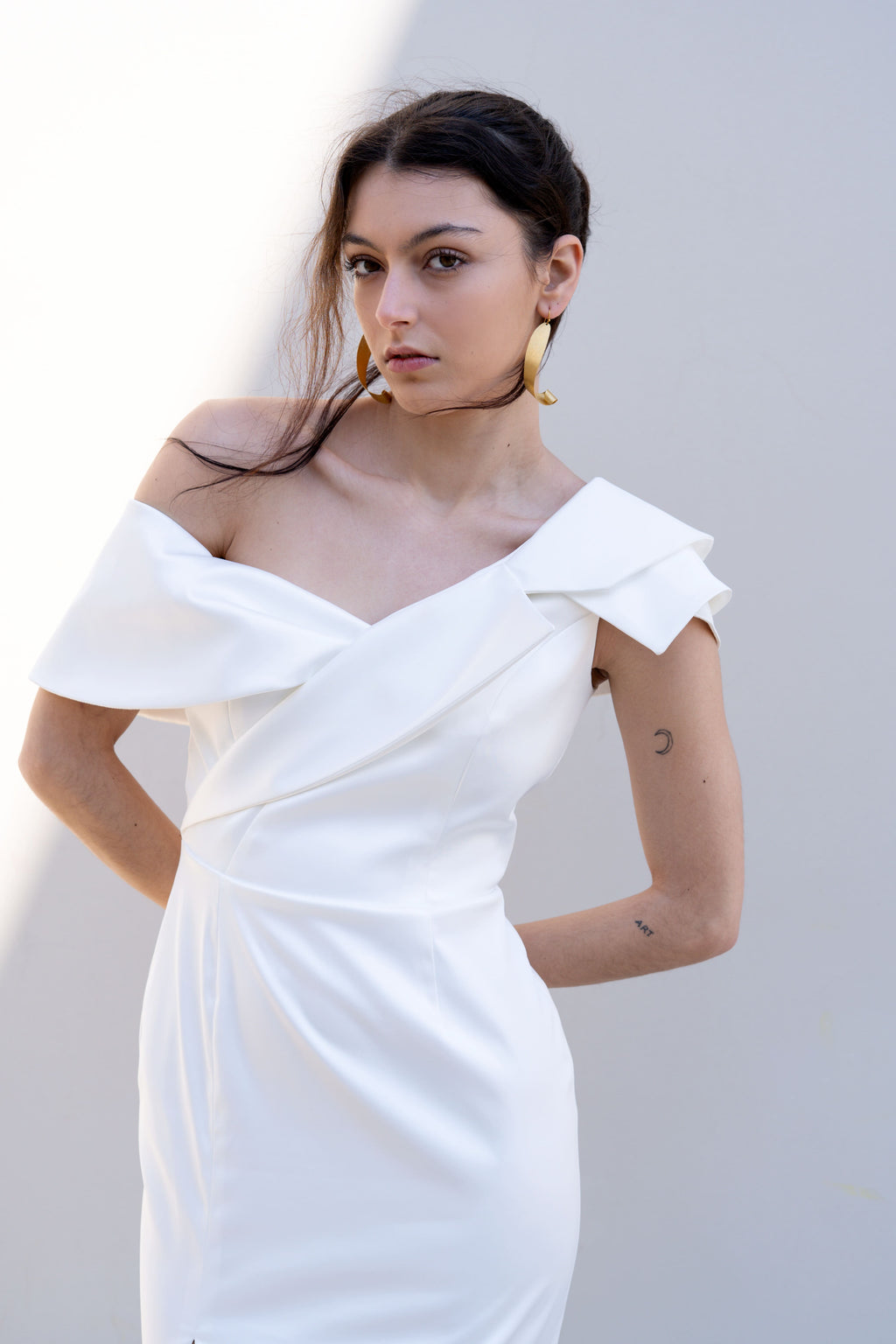 off-shoulder bridal dress with deconstructed lapel neckline close-up portrait