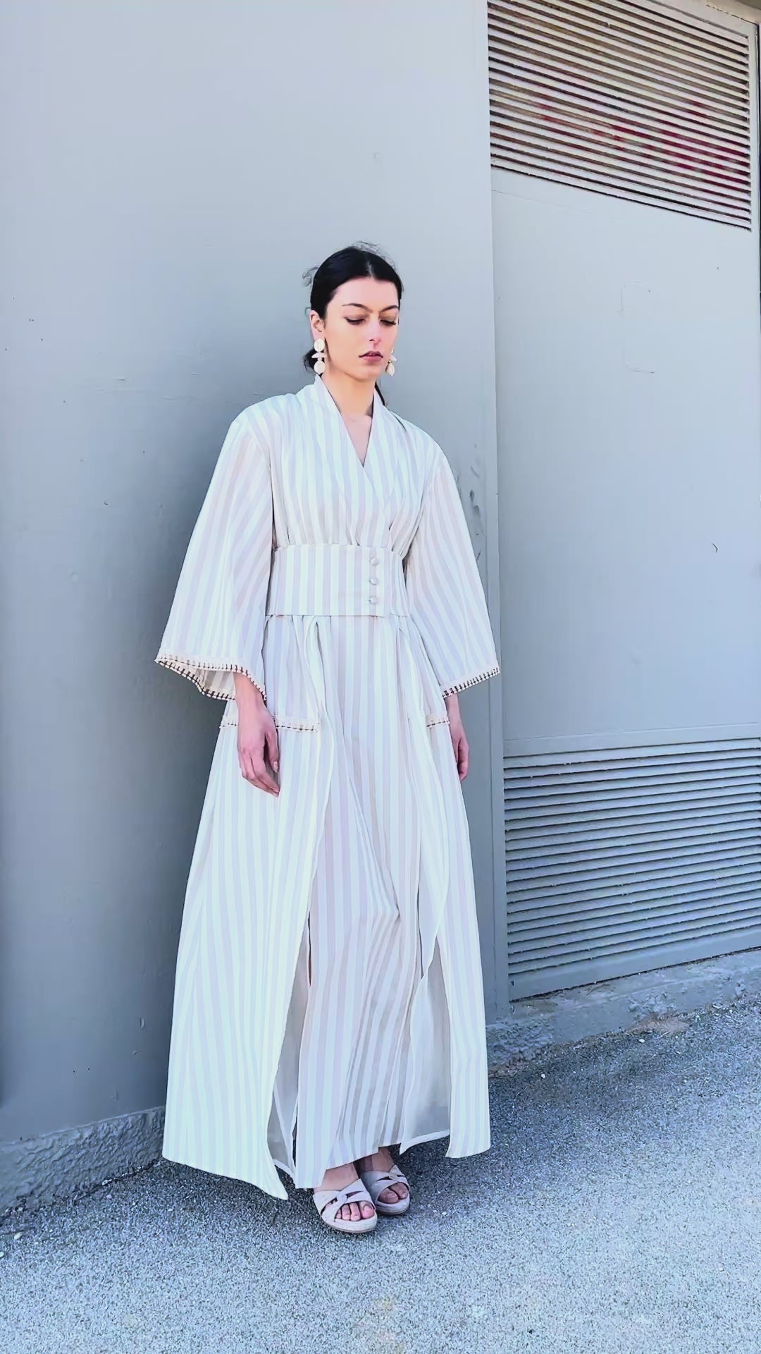 Striped cotton kimono dress full length front view with wide waist belt, soft drape and subtle slit detail video