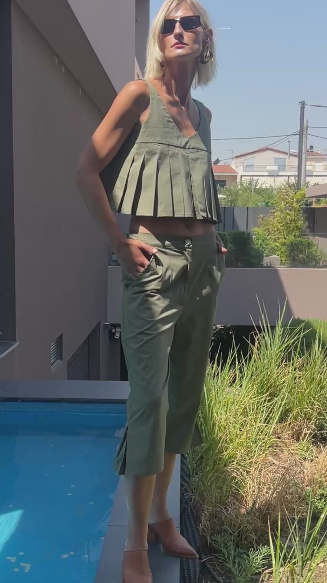 Julia Valas Elia set olive crop top and capri pants summer look in natural light movement