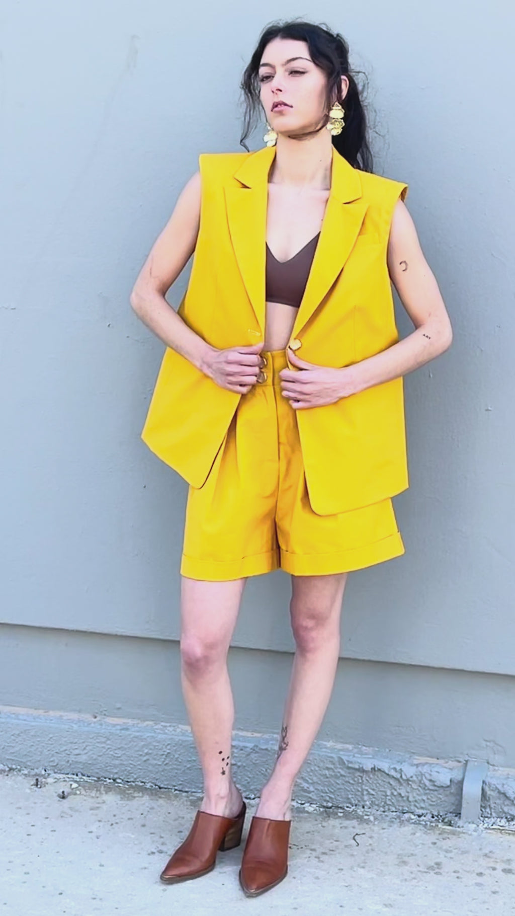 Canary yellow tailored vest styled open with matching pleated bermuda shorts, relaxed fit summer outfit, Video