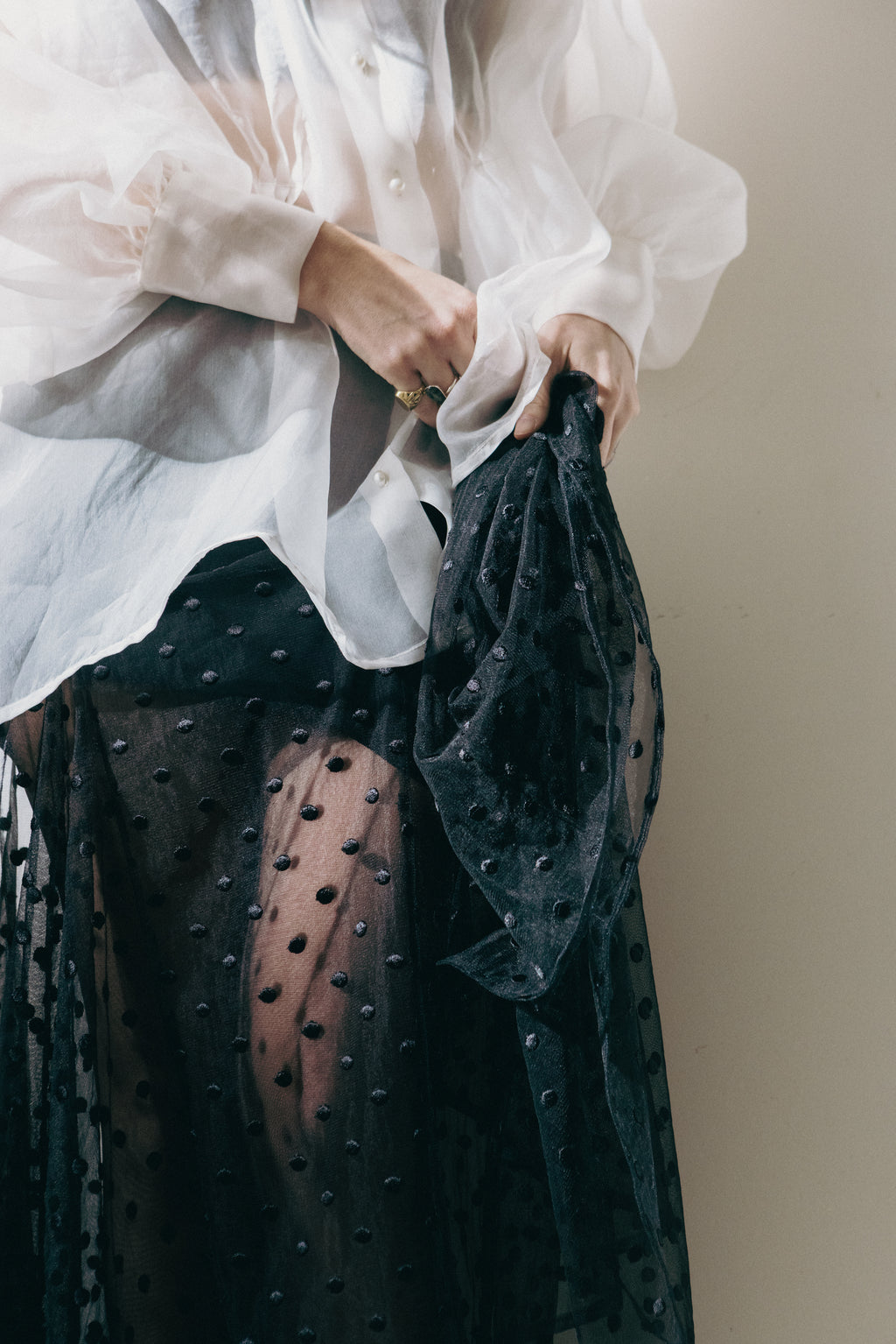 sheer black tulle skirt with embroidered polka dots detail styled with white shirt Julia Valas